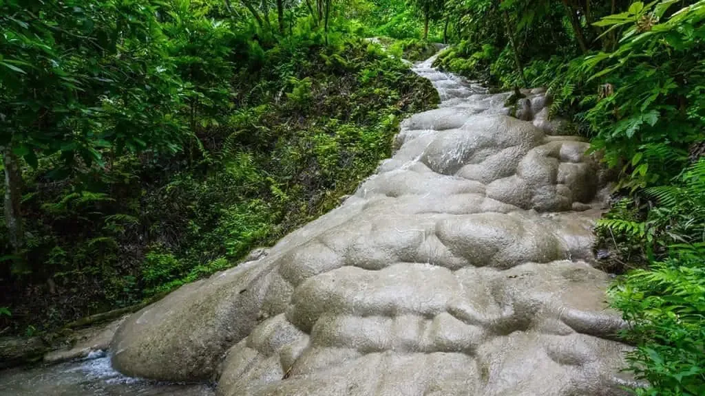 Famous sticky water fall in green season of Chiang Mai